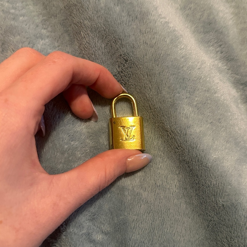 Louis Vuitton Gold Lock
